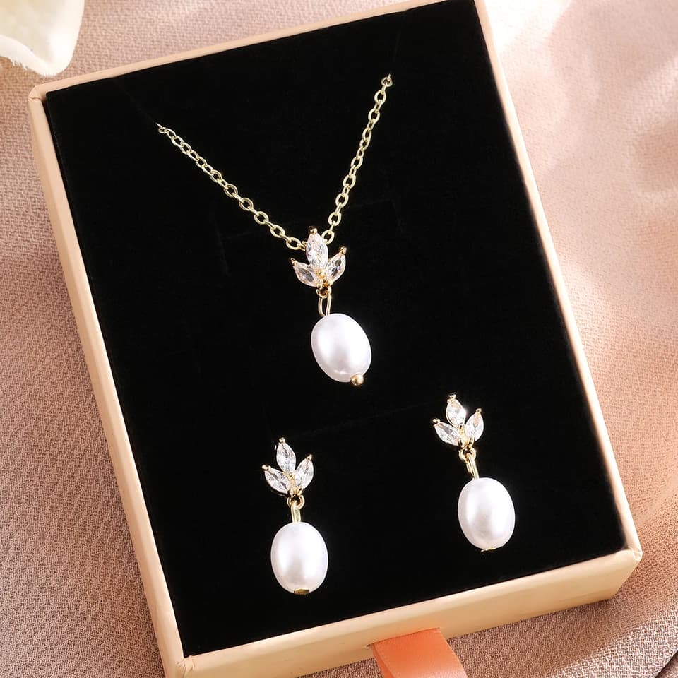 ZAKOL Elegante set di collane con orecchini pendenti con perle imitazione zirconi lucidi per regali di gioielli per feste di lusso da donna