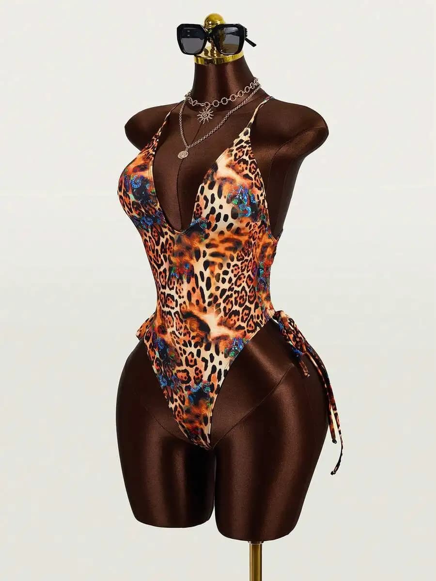 Costume da bagno intero con stampa leopardata, scollo a V profondo e taglio alto sulla gamba, per la spiaggia