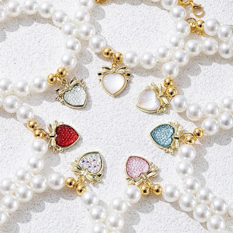 Accessori per collane di perle regolabili per animali domestici Ciondolo a forma di cuore Bowknot Collare per gatti Chihuahua Catena per collo di cani Forniture per toelettatura di animali domestici