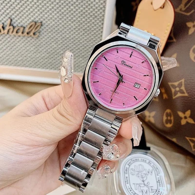 Nuovo orologio rotondo a righe da donna, elegante e sofisticato, con un versatile cinturino in acciaio inossidabile. Orologio da polso da donna.