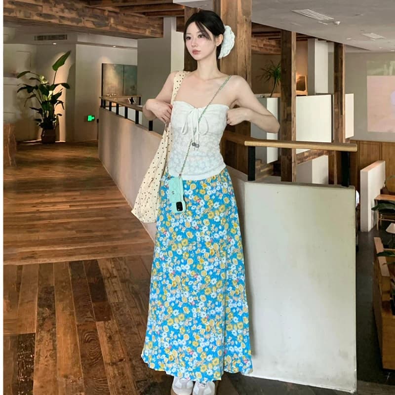Top sexy senza spalline con design traforato per donna, set due pezzi con gonna aderente a fiori in stile vacanza estiva.