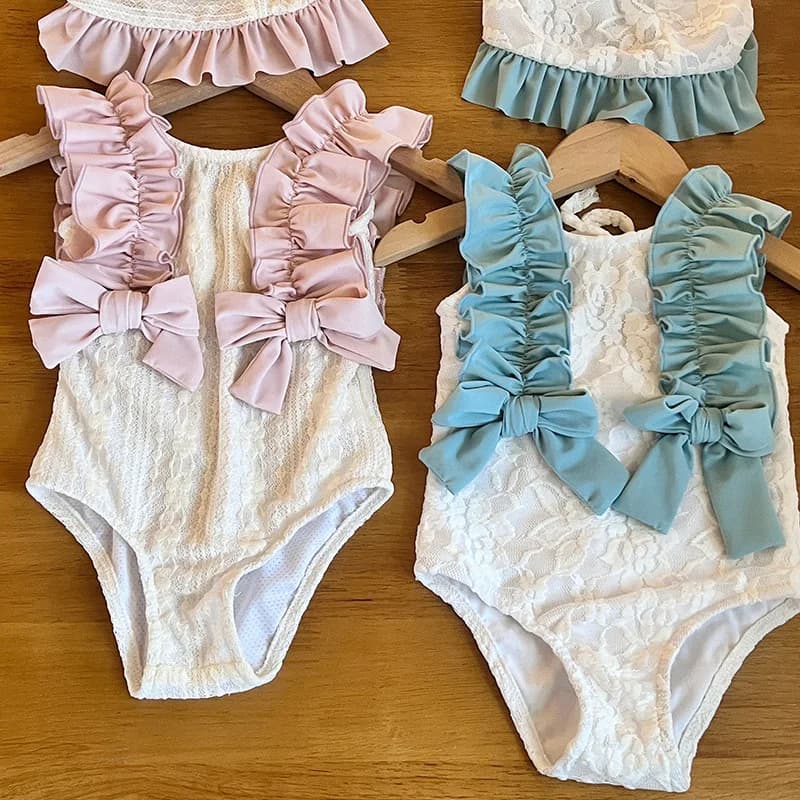 Nuovo costume da bagno estivo per bambini per ragazze carino costume da bagno con fiocco in pizzo 2-7T costumi da bagno per bambini vestiti per le vacanze al mare