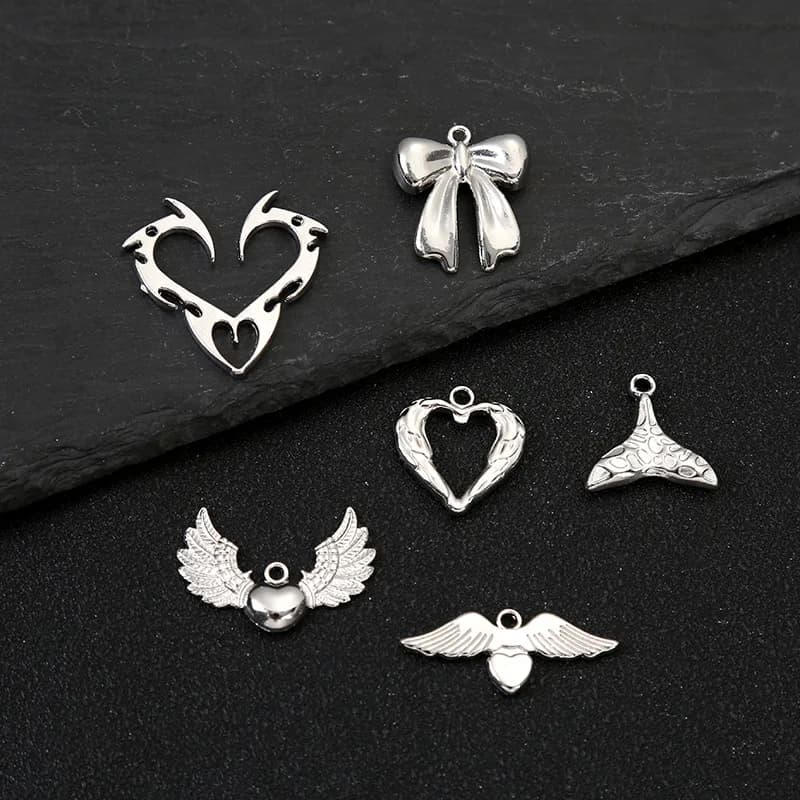 8 pezzi di ciondoli cavi in lega di zinco stile retrò ali a coda di pesce ciondolo d'amore per realizzare orecchini collana artigianato fai da te accessori di gioielli