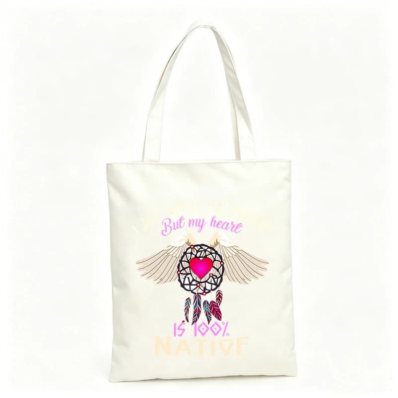 Women's canvas tote bag with dreamcatcher and heart graphic, ideal for casual daily use and summer outings