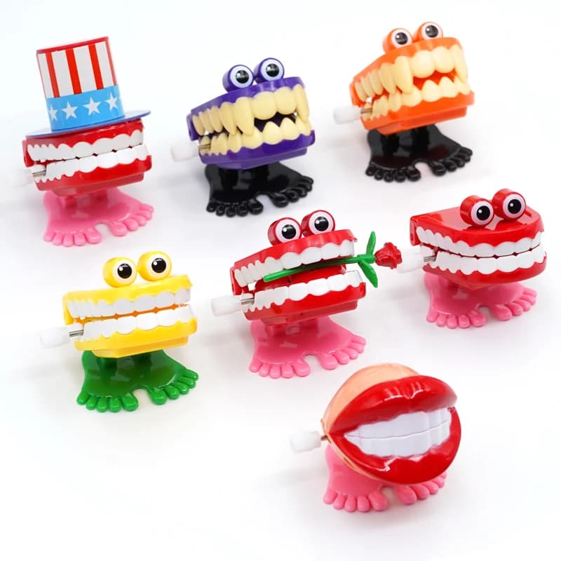 Regalo per i denti Novità Giocattolo a orologeria Divertimento Natale Halloween Giocattoli a carica per bambini Denti che saltano in plastica Regali per dentisti dentali