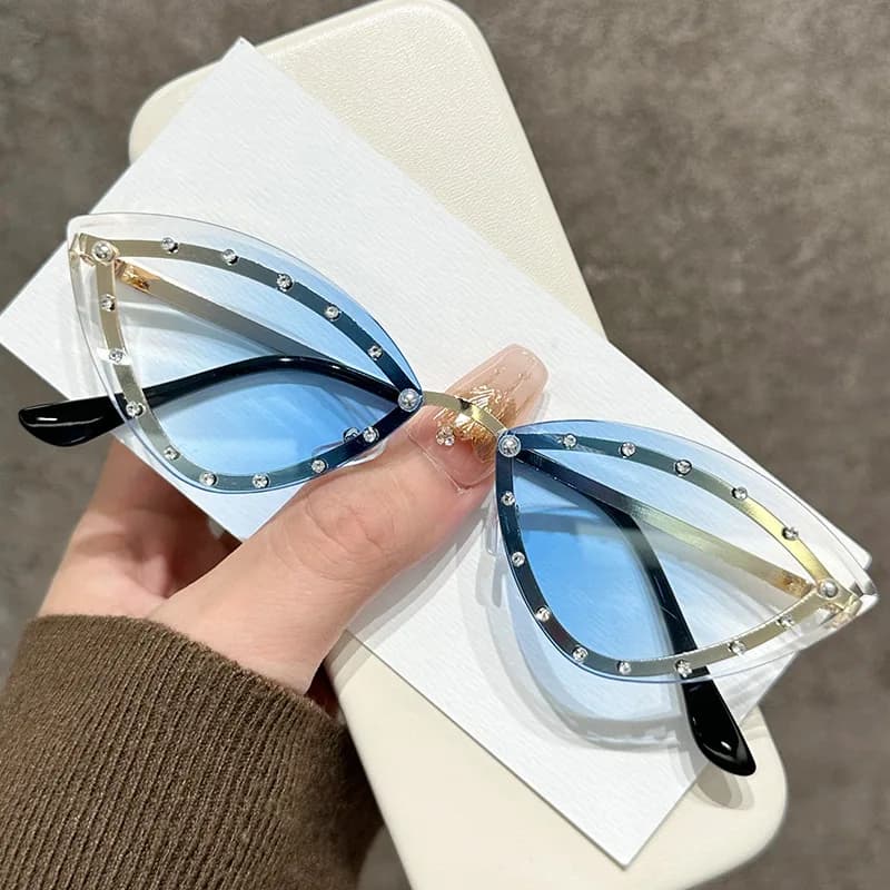 Nuovi occhiali da sole triangolari a occhio di gatto senza montatura con diamanti, stile europeo e americano, colorati, alla moda.