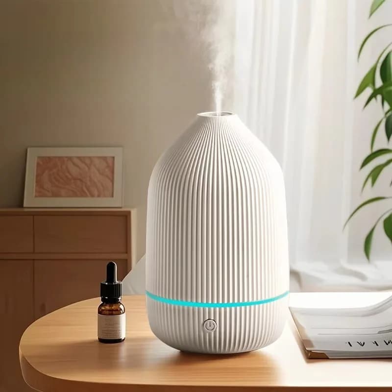 Diffusore di oli essenziali ad ultrasuoni e umidificatore per aromaterapia con illuminazione d'atmosfera a LED a 7 colori per l'arredamento della camera da letto