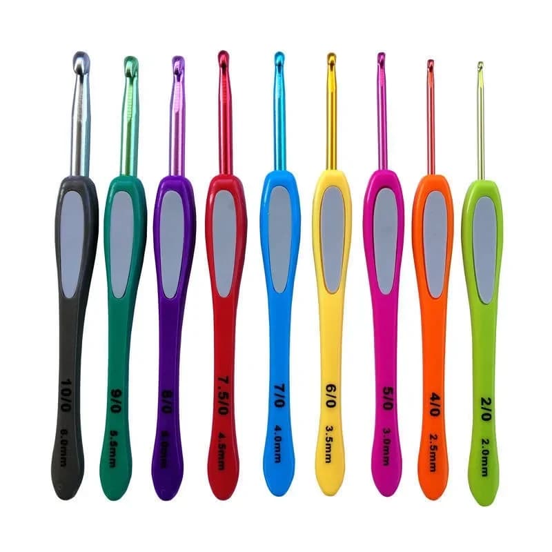 Set of crochet tools with colorful soft handle Set of nine pieces for hand knitting in thick wool with fine needle and scarf