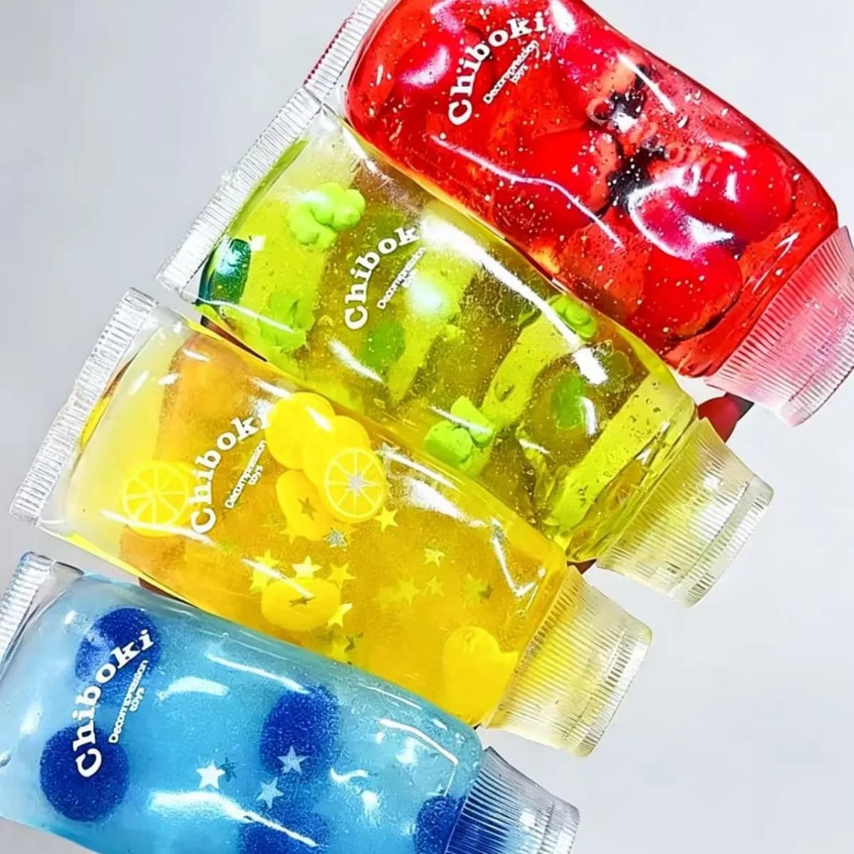 1pc Mini Fruit Drink Bottle Squishy Toy, Transparent Water Bottle Squeeze Fidget Toy, 3D Fruit Inside Pinch Toy, Novelty Stress Relief Hand Toy for Teens Adults