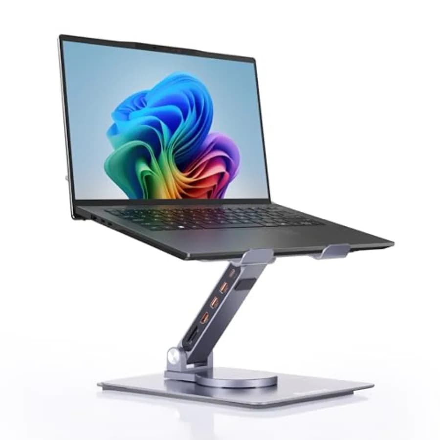 Supporto per laptop da scrivania con corpo in lega di alluminio, finitura nero opaco, rotazione a 360° e hub USB 6-in-1 integrato per un utilizzo versatile