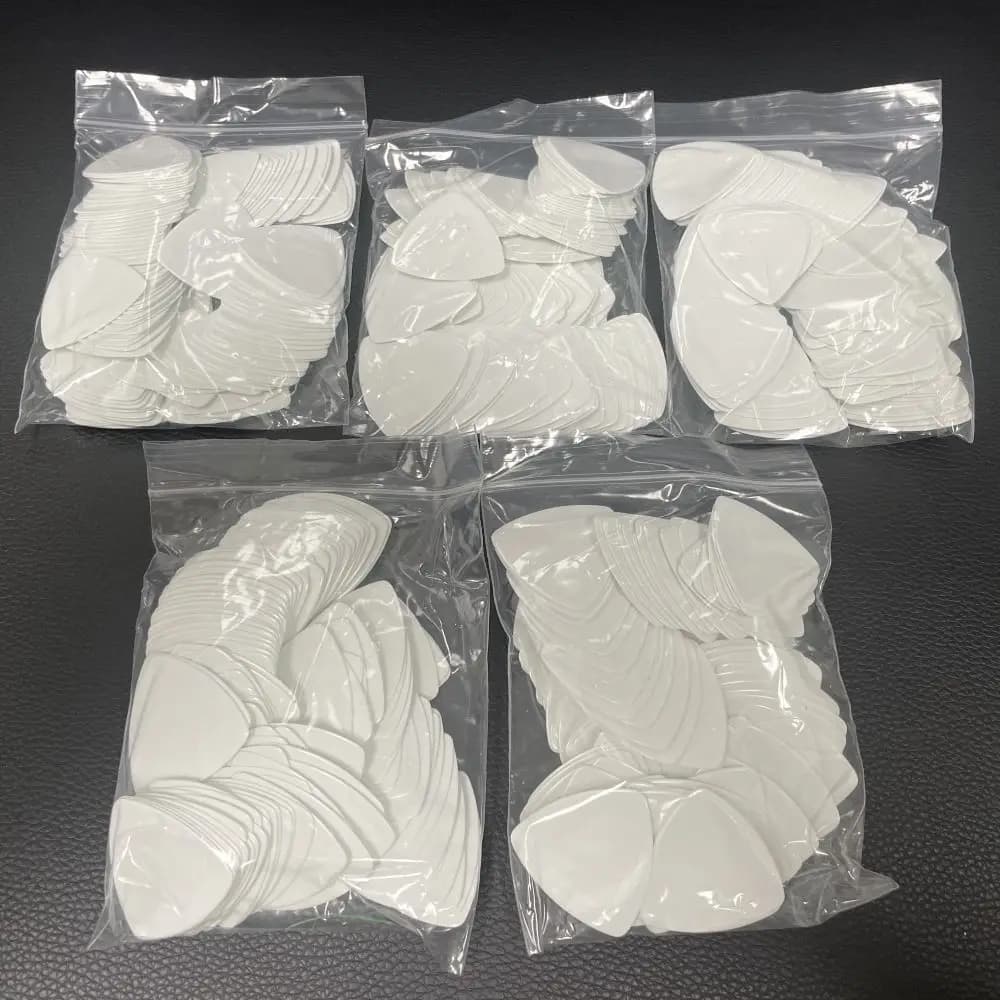 Plettri per chitarra triangolo arrotondato grande in celluloide bianco solido all'ingrosso 500 pz/lotto 0.71mm 0.96mm