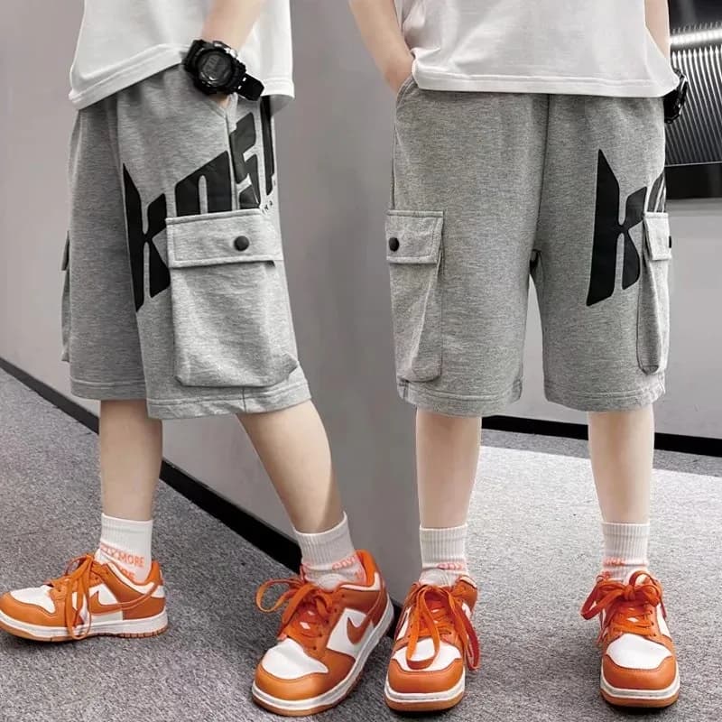 Nuovi pantaloncini per bambini per ragazzi Pantaloni tascabili con stampa di lettere in cotone casual estivo Moda Streetwear Pantaloncini per adolescenti Abbigliamento sportivo