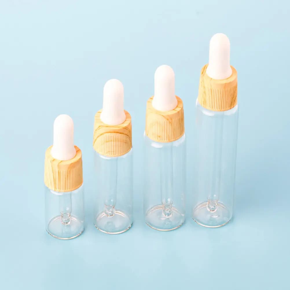 4 flaconi contagocce in vetro trasparente da 5 ml con effetto legno per oli essenziali, liquidi per il sollievo muscolare e tonici per la cura della pelle