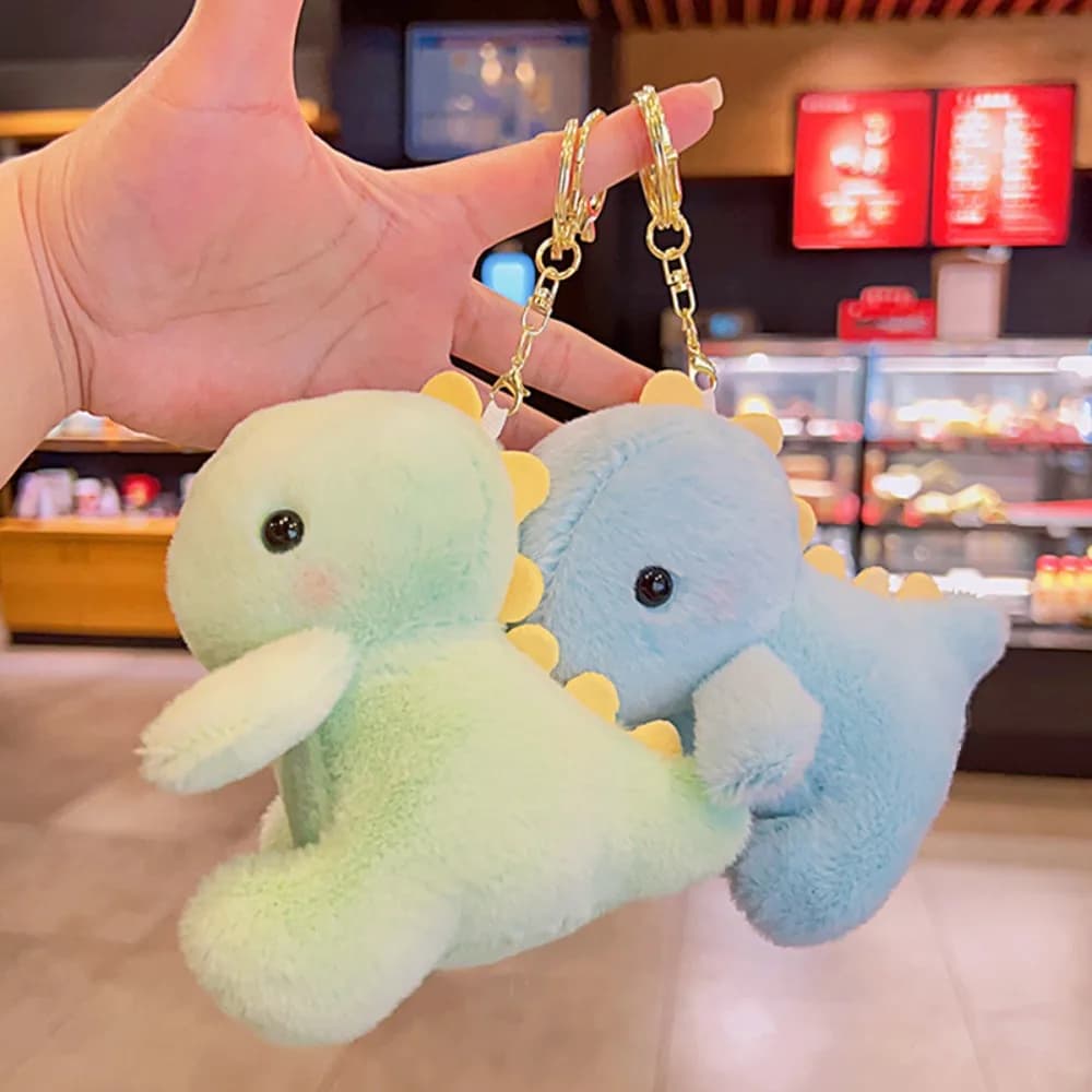 Kawaii 12cm dinosauro peluche bambola giocattoli ciondolo carino multiuso peluche portachiavi portatile bambola di pezza portachiavi zaino