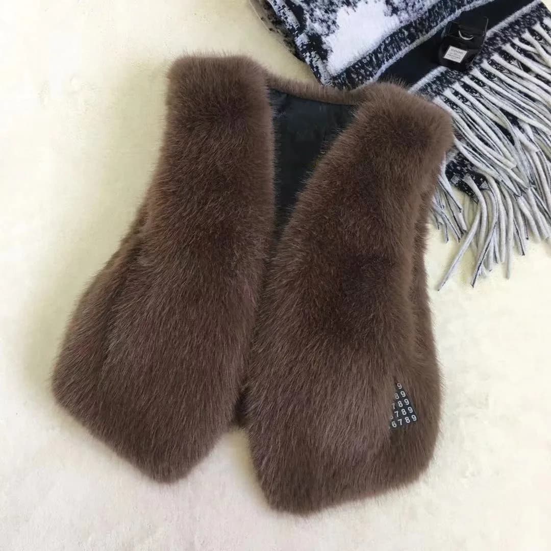 Gilet di pelliccia da donna Nuovo gilet femminile autunno inverno coreano caldo bianco nero rosa giacca di pelliccia sintetica moda canotta cappotti senza maniche