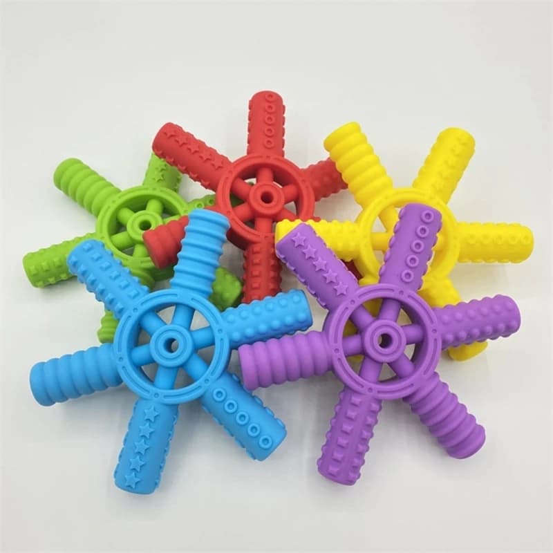 Massaggiagengive per bambini in silicone per uso alimentare Massaggiagengive lenitivo a forma di timone Giocattolo sensoriale educativo Massaggiagengive per neonati Giocattolo per massaggiagengive