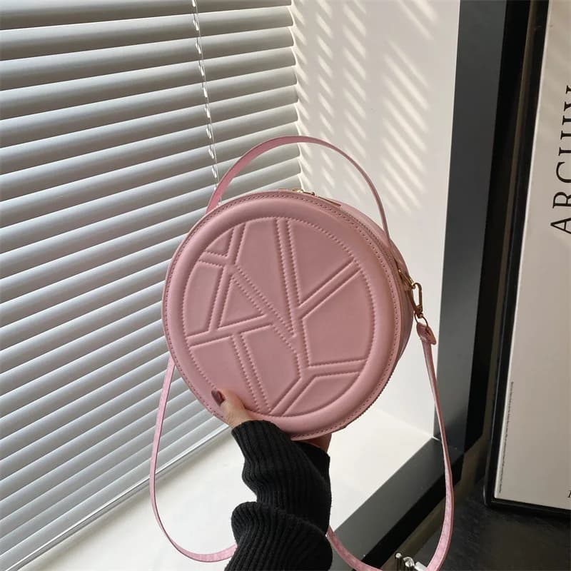 Solid color hand-held small round bag 2025 new bag, women's fashion shoulder bag, casual personalized crossbody bag