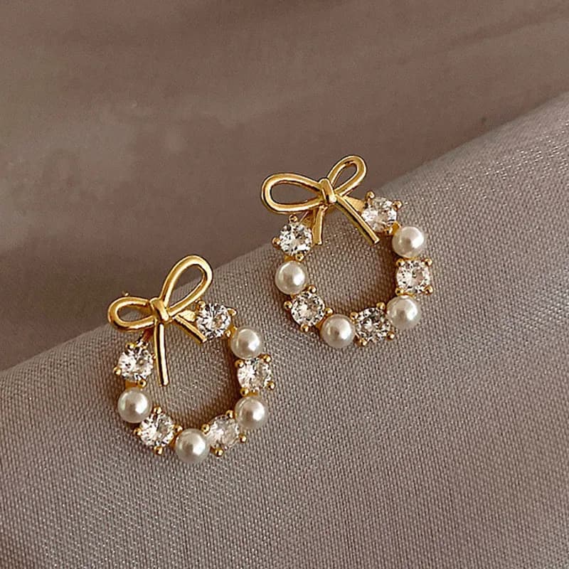 Orecchini a perno con fiocco in perle sintetiche e cristalli alla moda per donna e ragazza, orecchini coreani carini, gioielli di tendenza per feste, all'ingrosso