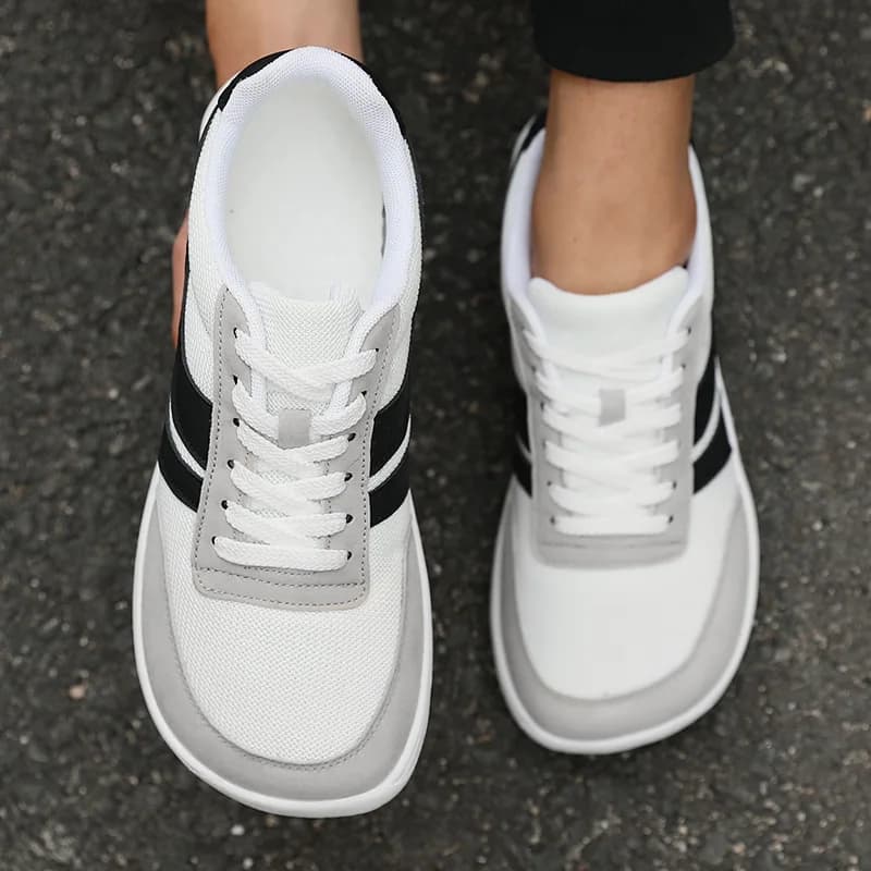 Scarpe da uomo Sneakers a punta larga Moda Nuova suola morbida Scarpe larghe per l'Ultimo Scarpe casual da esterno Scarpe a piedi nudi in rete unisex Tenis De Hombre