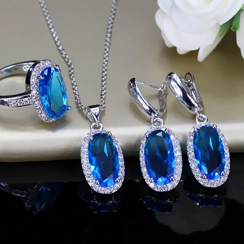 ThreeGraces Trendy ovale azzurro Cubic Zirconia orecchini Color oro bianco collana anello Set per le donne Chic gioielli quotidiani JS598