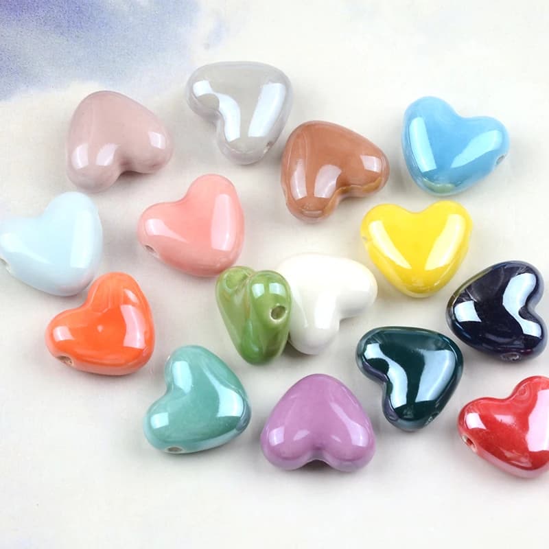 Perline in ceramica a forma di cuore con foro incrociato in tinta unita da 15 mm Perline distanziatrici allentate per la creazione di gioielli Collana fai da te Bracciali Ciondolo