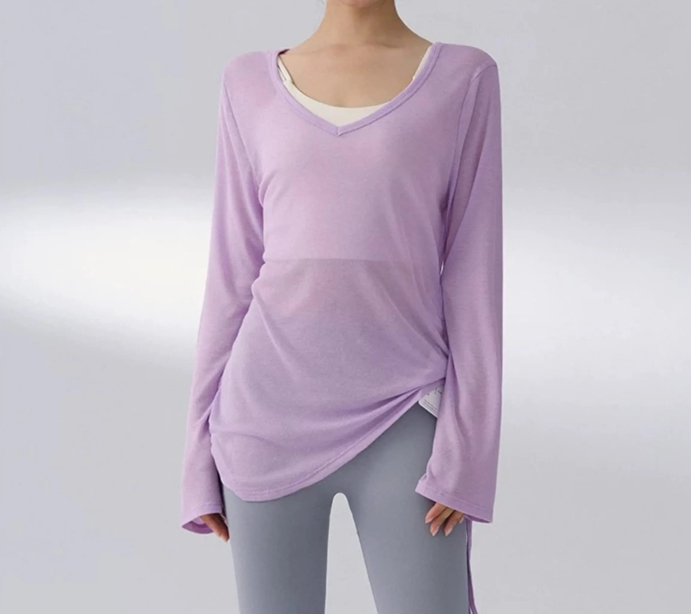 Wide women's sweatshirt with drawstring, long sleeves, which hides hips, asymmetrical, for Pilates, gym and yoga