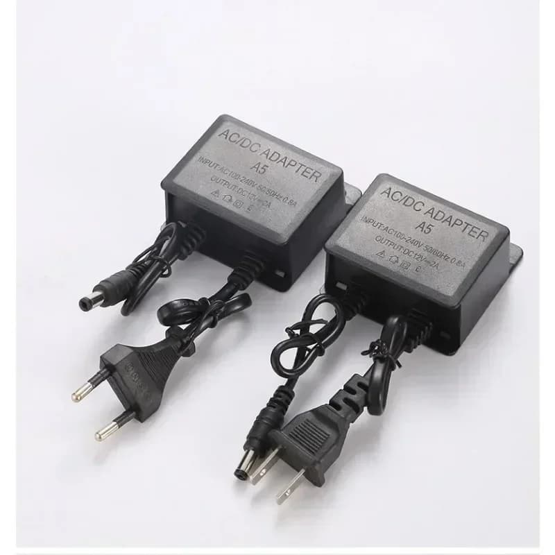 Alimentatore ESCAM Caricabatterie AC DC 12V 2A Spina EU/US Impermeabile per Esterni per Monitor CCTV Telecamera di Sicurezza CCD