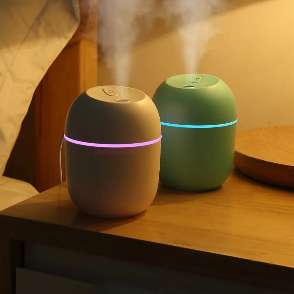 Mini umidificatore USB con diffusore di oli essenziali a luce LED purificatore d'aria per auto creatore di nebbia aromatica 220ML