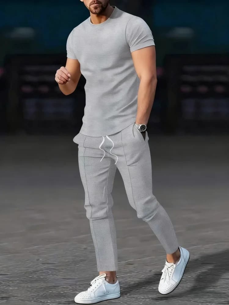 Fashionable and casual summer sports set, consisting of breathable t-shirts and long trousers.