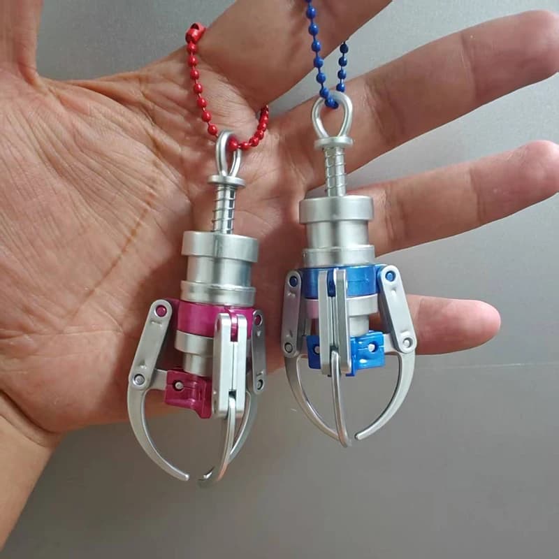 1 pz creativo tipo di stampa catturare bambole modello artiglio portachiavi mini simulazione artiglio macchina decompressione portachiavi zaino pendente