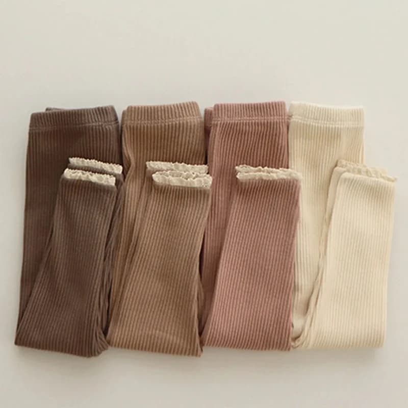 Leggings appena nati per vestiti della neonata neonati bambini Leggings in cotone solido a coste bocca del piede in pizzo pantaloni Skinny abbigliamento per bambini