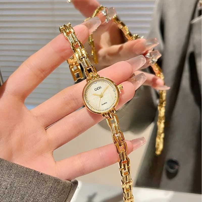 Orologio da donna con cinturino in oro di lusso, catena elegante, piccolo quadrante circolare, orologio da polso al quarzo da donna, miglior orologio da donna