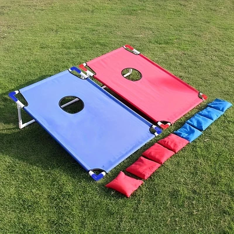 Red and blue portable Cornhole game set, folding and durable, with beach bag.