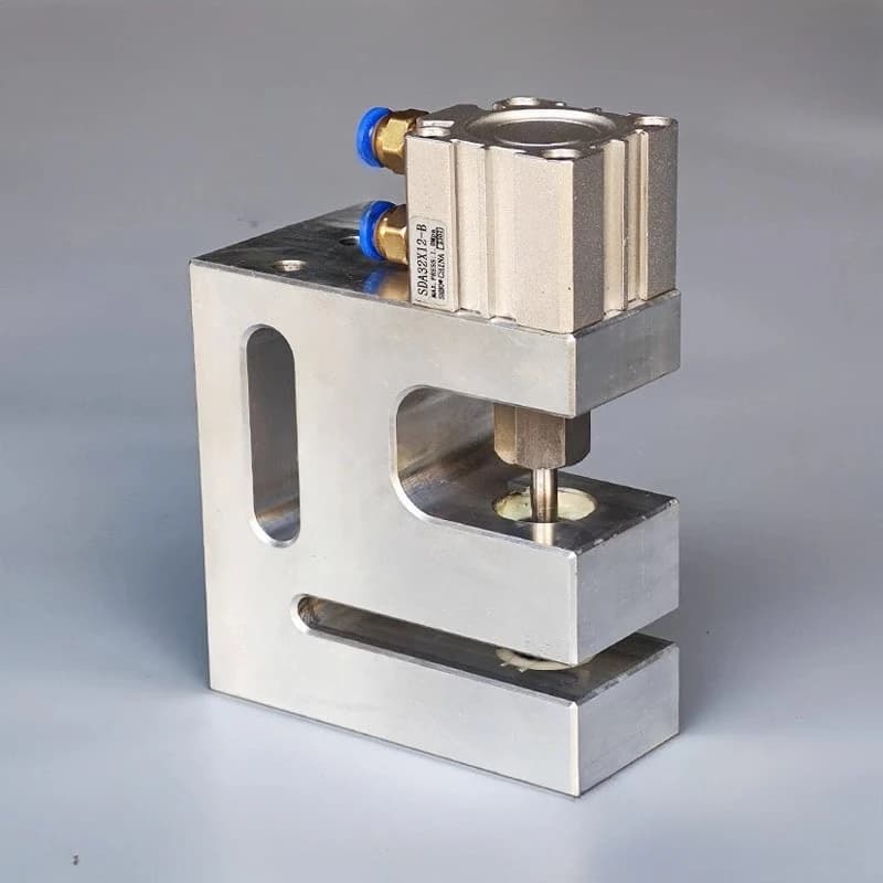 Punching machine for bag production machines, for small round holes, pneumatic, for 80 mm plastic bags edge sealing