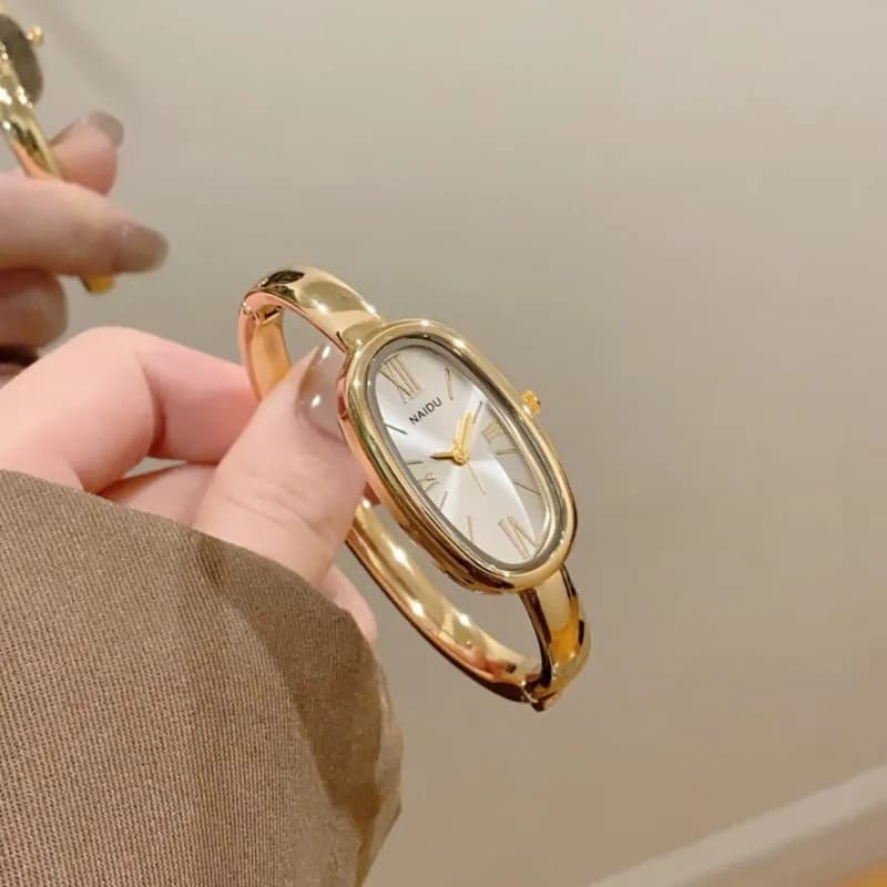 Orologio da Polso da Donna di Lusso con Quadrante Ovale, Bracciale Dorato Semplice, Stile Romano, al Quarzo - Montre Femme