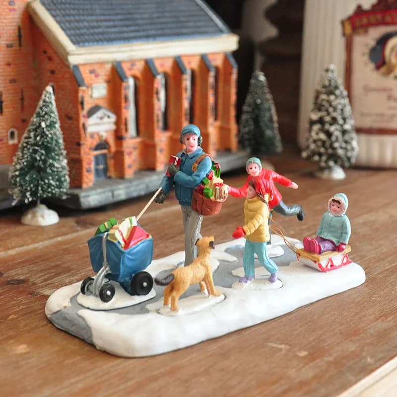 figura in resina mentale psicologico gioco da tavolo con sabbia terapia La scena di Natale va in viaggio e gioca con lo sci e il cane