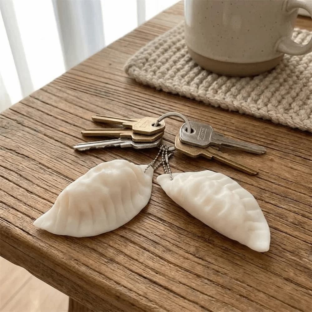 Portachiavi Creativo e Divertente a Forma di Raviolo, Realistico e Morbido, Mini Ciondolo a Forma di Cibo da Spremere, Accessorio per Zaino