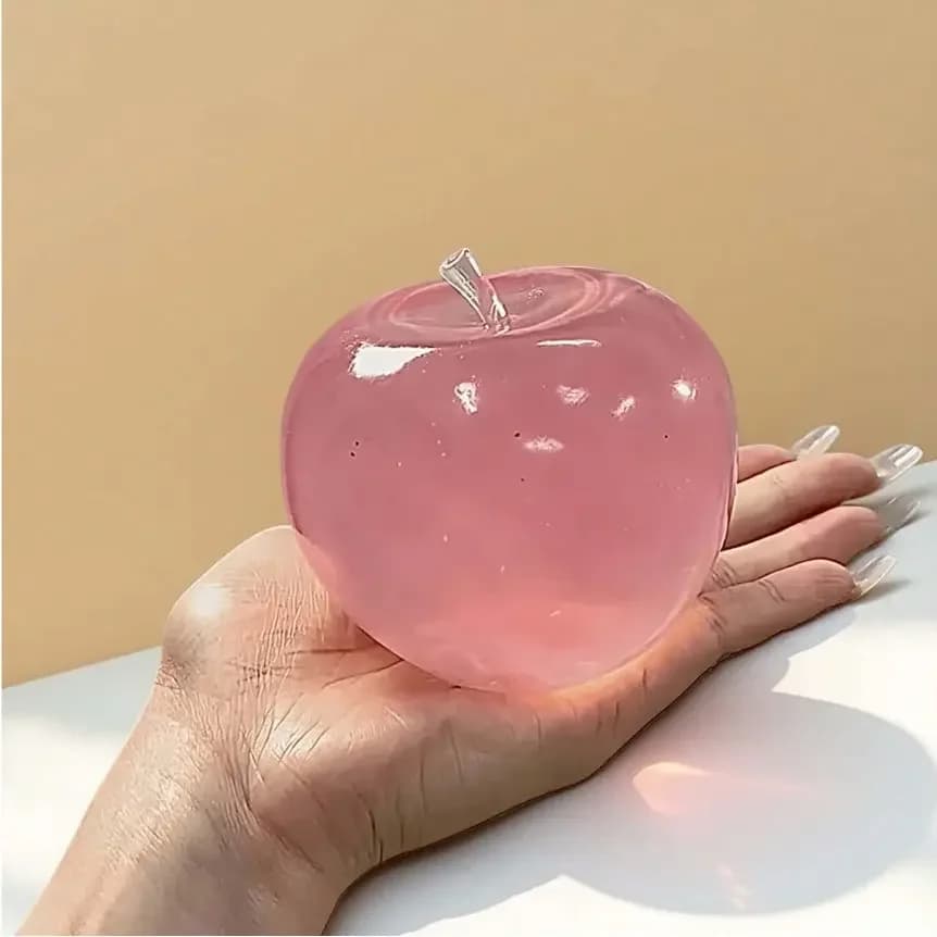 Antistress ball in the shape of a crystal apple, soft and smooth texture, ideal for relaxation in the office and the sensory game.