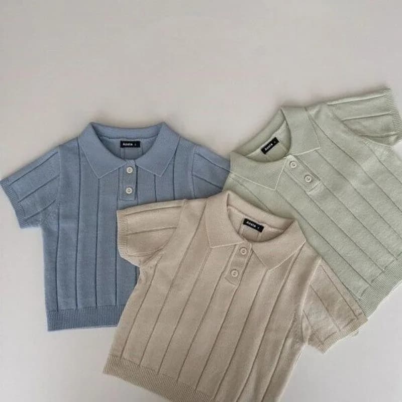 Pullover primaverile ed estivo da ragazzo con nuovi bottoni impiombati Top a maniche corte sottili ed eleganti lavorati a maglia in seta ghiacciata tinta unita