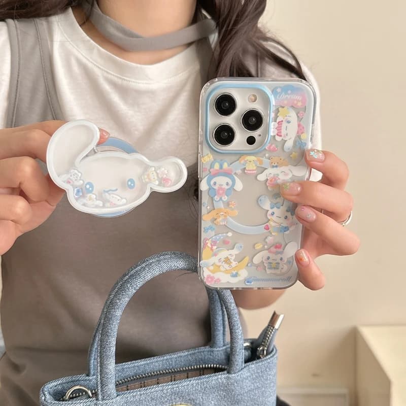 Simpatico cartone animato Sanrio Cinnamoroll Supporto per impugnatura magnetica Custodia per telefono con ricarica wireless Magsafe per iPhone 16 15 14 13 Pro Max Cover