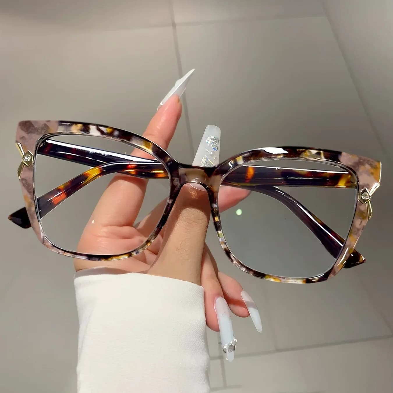 Nuovi occhiali da vista alla moda di alta gamma con design personalizzato, montatura a occhio di gatto, anti luce blu, con lenti piatte FL.