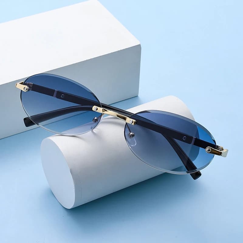 Donne popolari Uomini Shades Occhiali da sole ovali per donna Uomo Estate Viaggiare UV400 Occhiali da sole senza montatura Moda rotonda