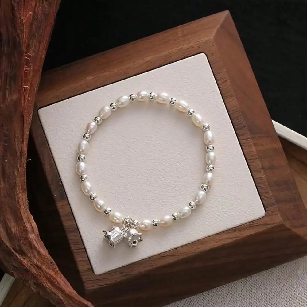Bracciale da donna con perle di orchidea, lusso leggero, braccialetto regalo di fascia alta alla moda e squisito, per le amiche