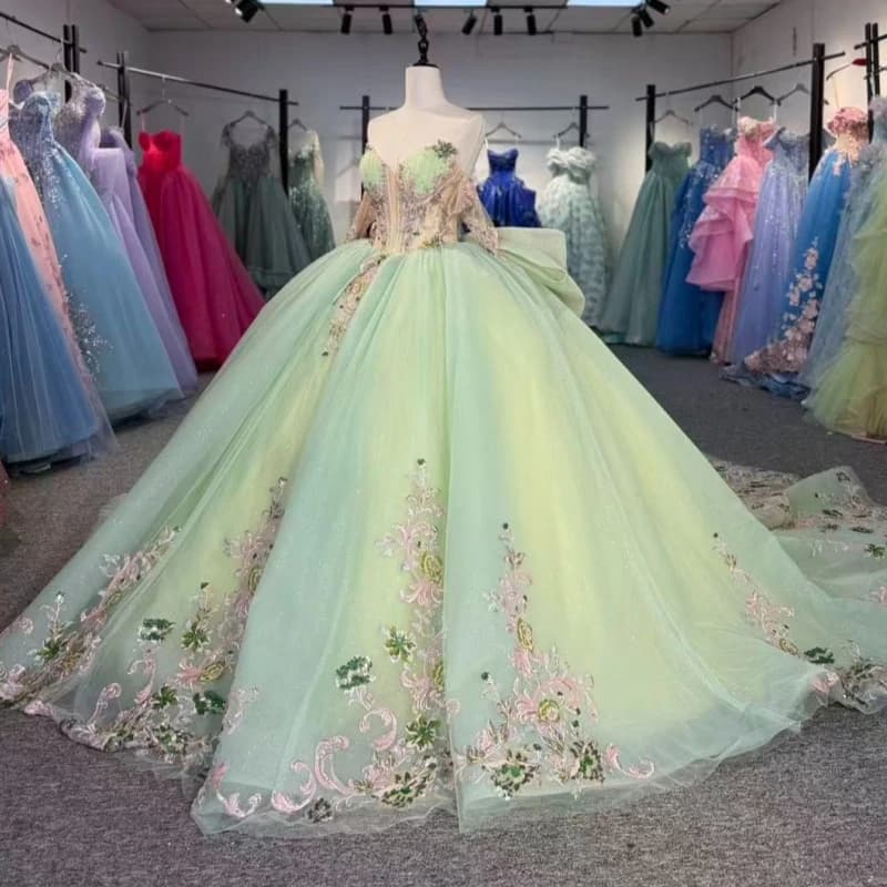 Abiti Quinceanera lucidi verde chiaro con spalle scoperte Applique con paillettes Perline in pizzo Fiocco di cristallo Corsetto in tulle Festa di compleanno Swee