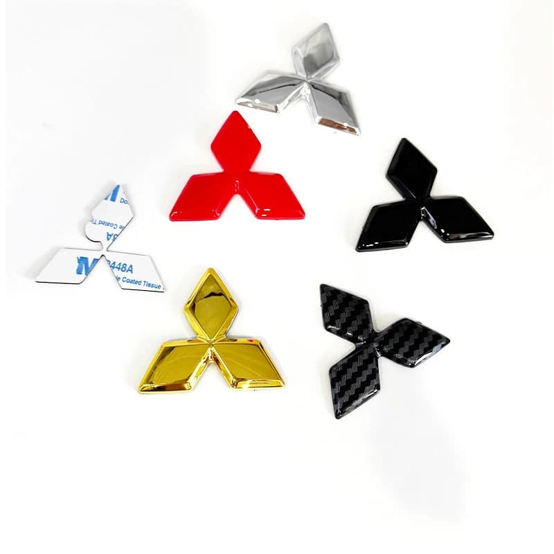 Adesivi decorativi per emblemi del volante dell'auto per Mitsubishi Outlander Lancer ASX Eclipse L200 Pajero Triton EVO Attrage