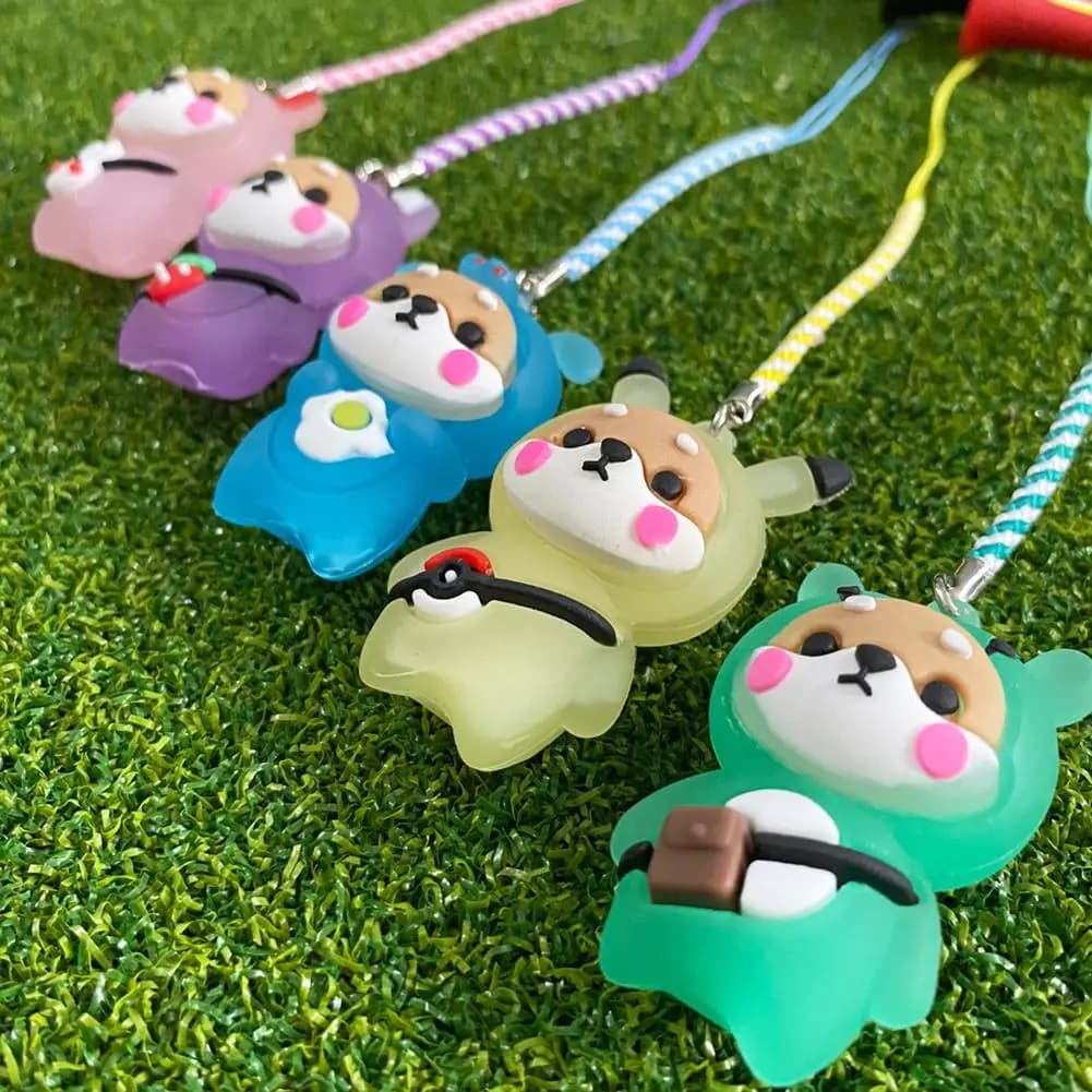 Il simpatico cartone animato previene la perdita del supporto per palline da golf con magliette in gomma da golf in corda intrecciata con accessorio da golf all'aperto con luce lampeggiante