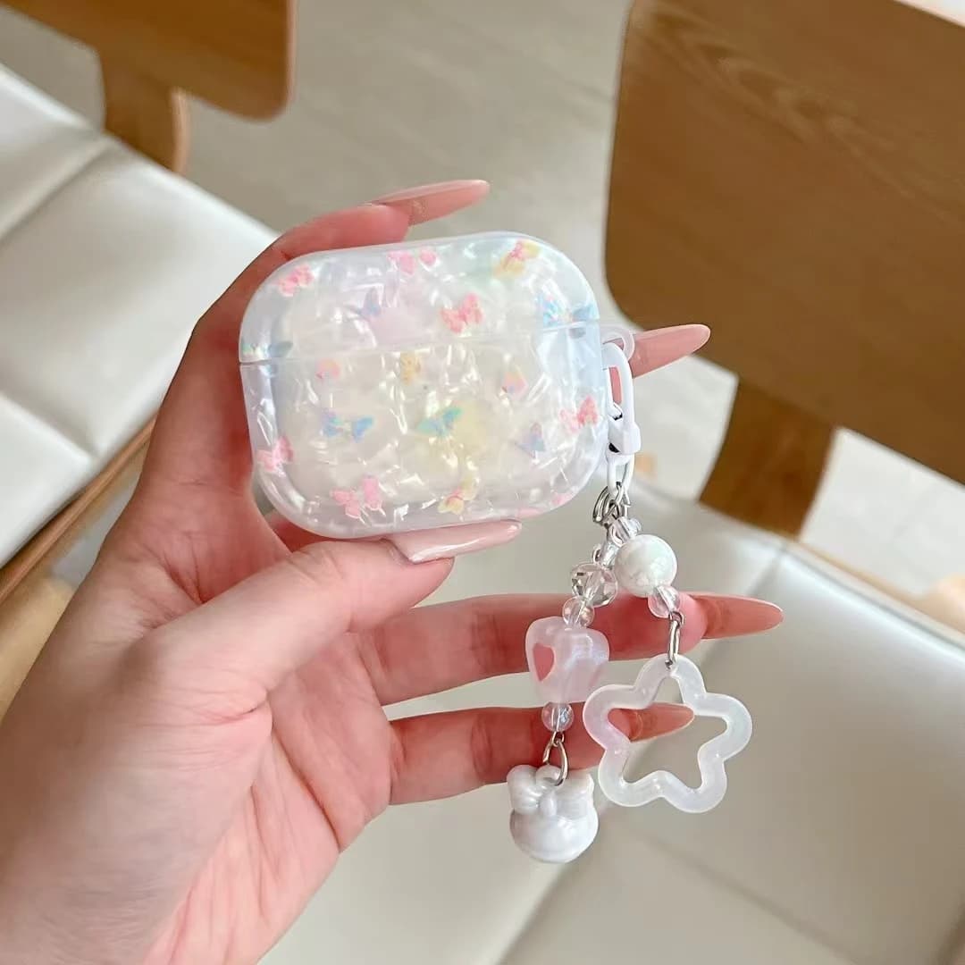 Custodia con texture a conchiglia a farfalla da giardino di fiori freschi per AirPods 1 2 3 4 Pro 3 Custodia per auricolari con braccialetto floreale per AirPod Pro3