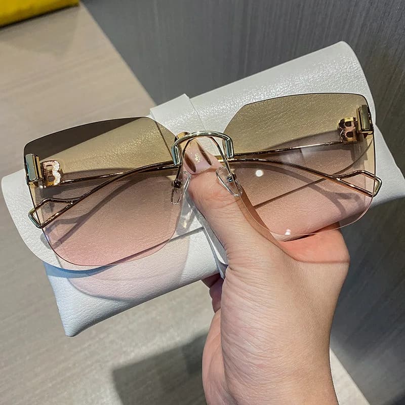 Occhiali da sole firmati Vintage donna 2024 moda occhiali da sole senza montatura oversize per uomo Retro Square Shades Oculos UV400