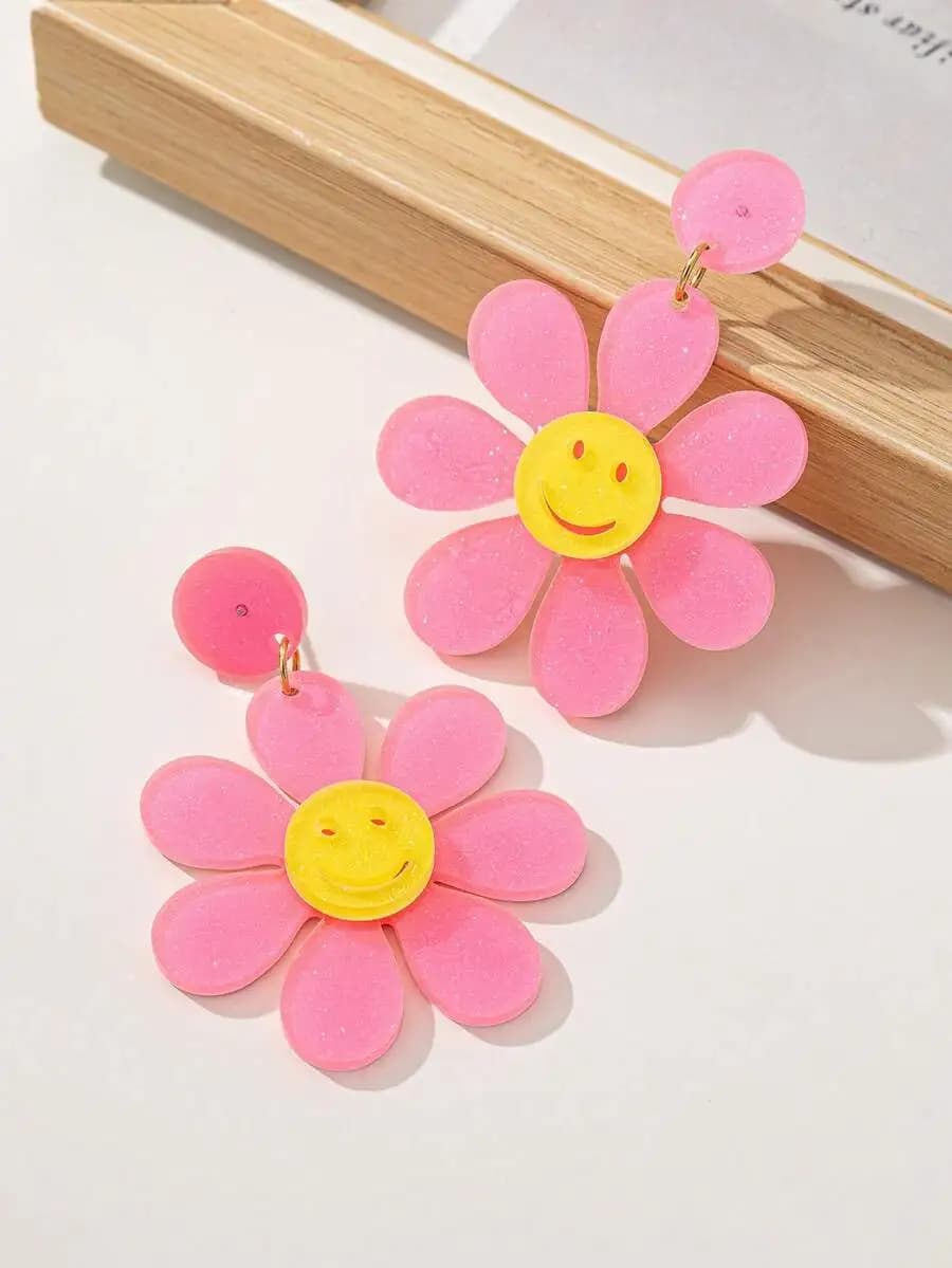 Glittery Pink Daisy Drop Earrings With Yellow Smiley Face Center For Adults