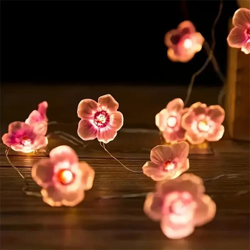 1 pezzo lungo 2 m con 20 lucine a forma di fiore di ciliegio in rosa, alimentate a batteria, adatte per la decorazione di ghirlande interne